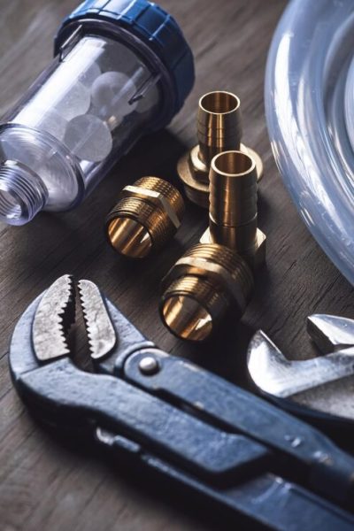 imgi_21_plumbing-different-wrenches-pipe-tube-fittings-connectors-wooden-rustic-table_689970-175